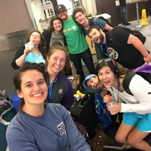 Courtlyn Holley (front) and Nathan Cash (back) take a selfie with the rest of the team.